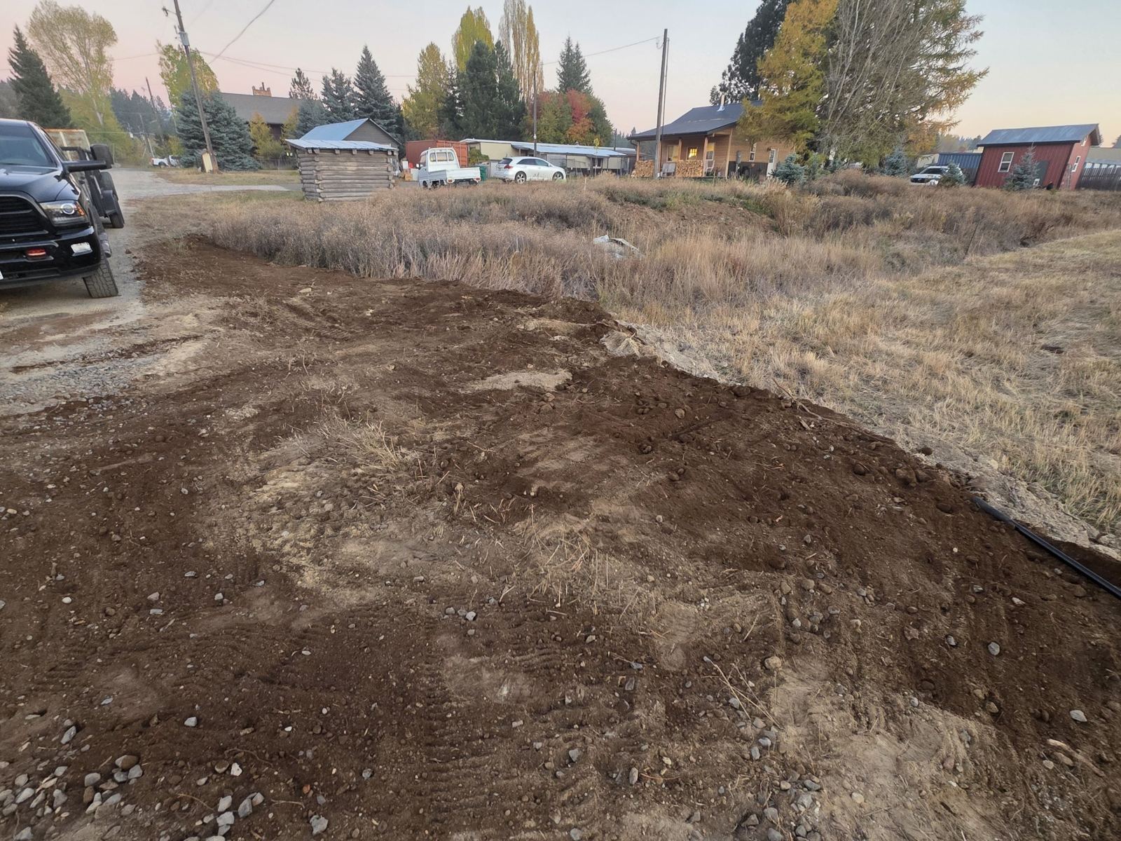 Freshly graded dirt along a road